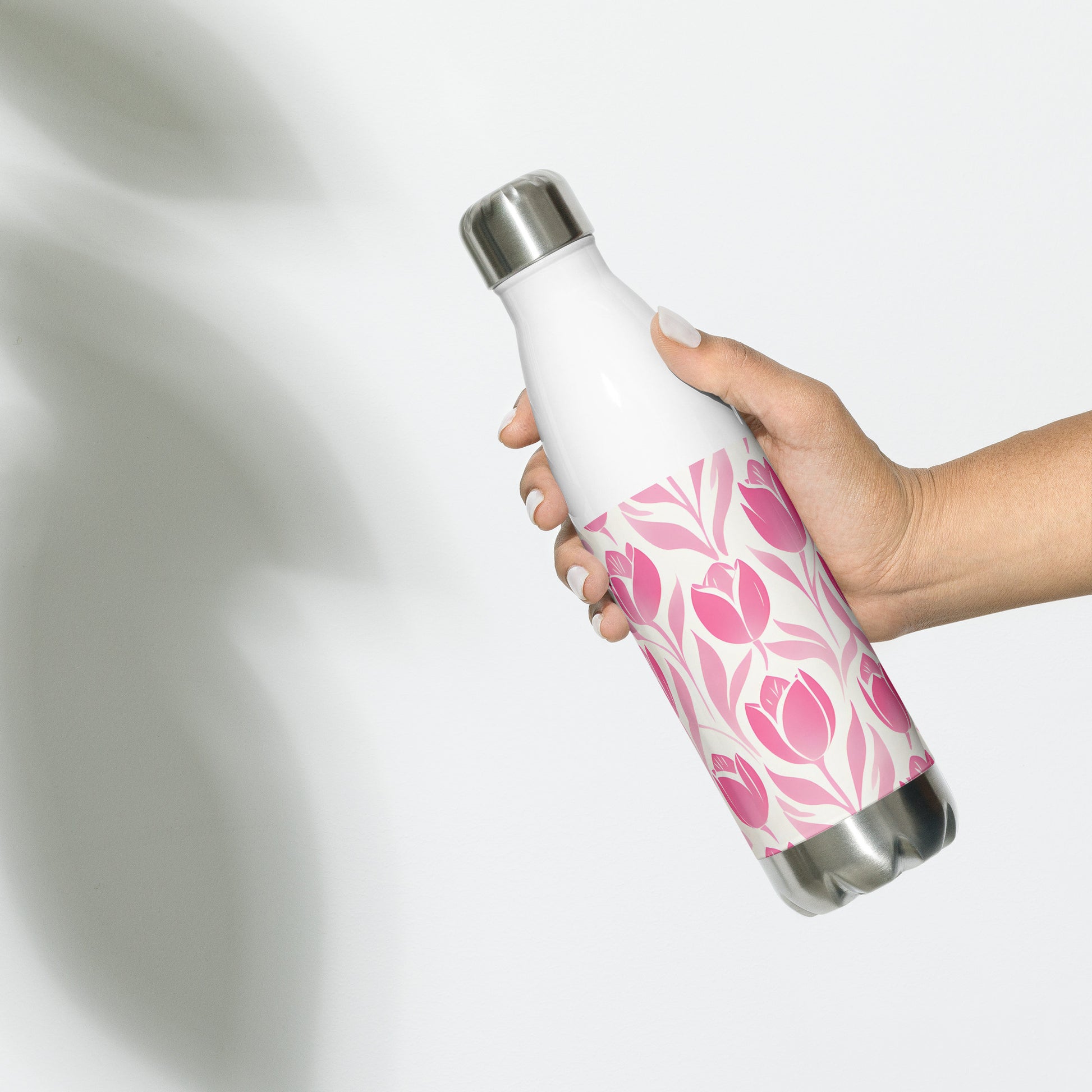 Lifestyle Image: Model carrying Block Print Pastel Pink Tulip Water Bottle