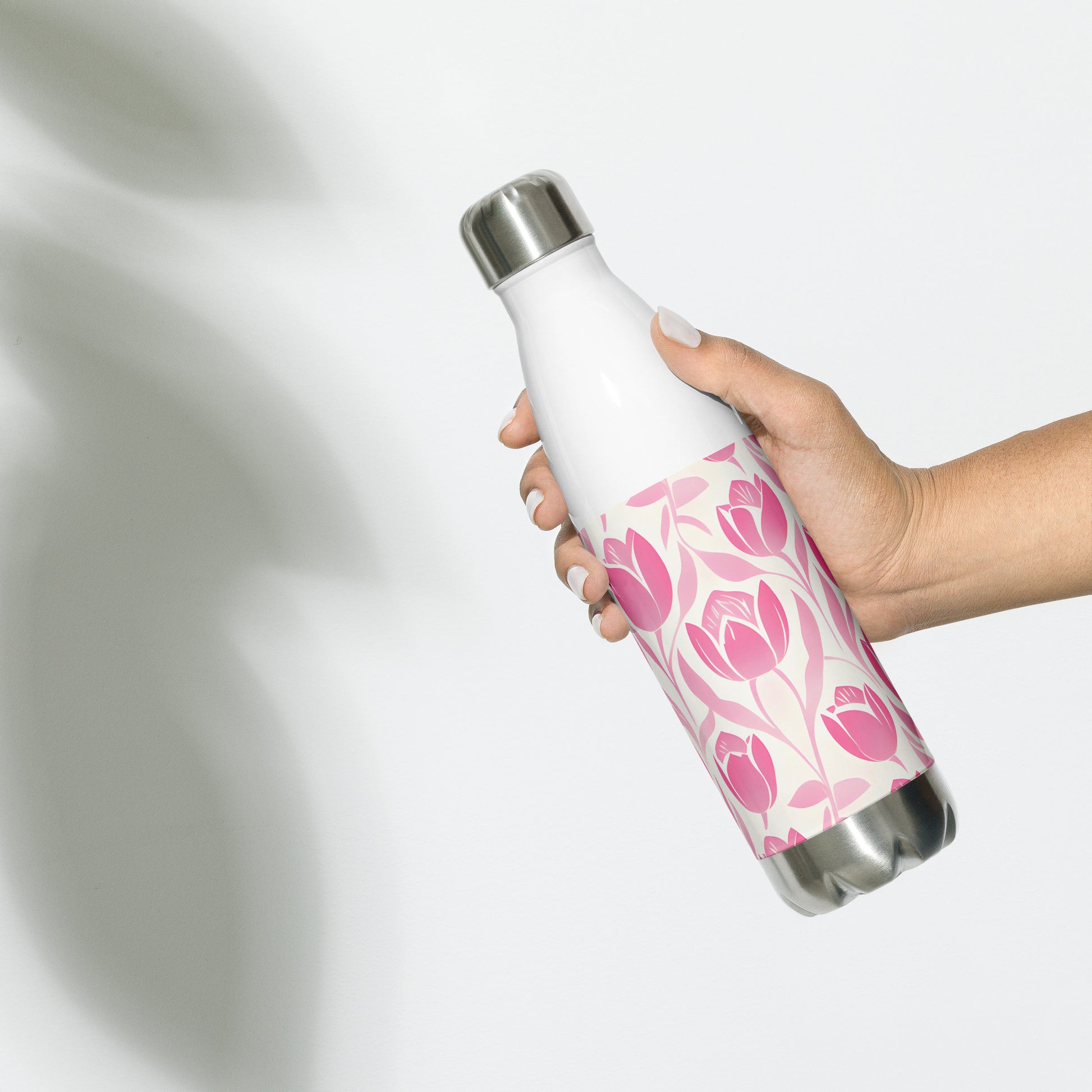 Lifestyle Image: Model carrying Block Print Pastel Pink Tulip Water Bottle